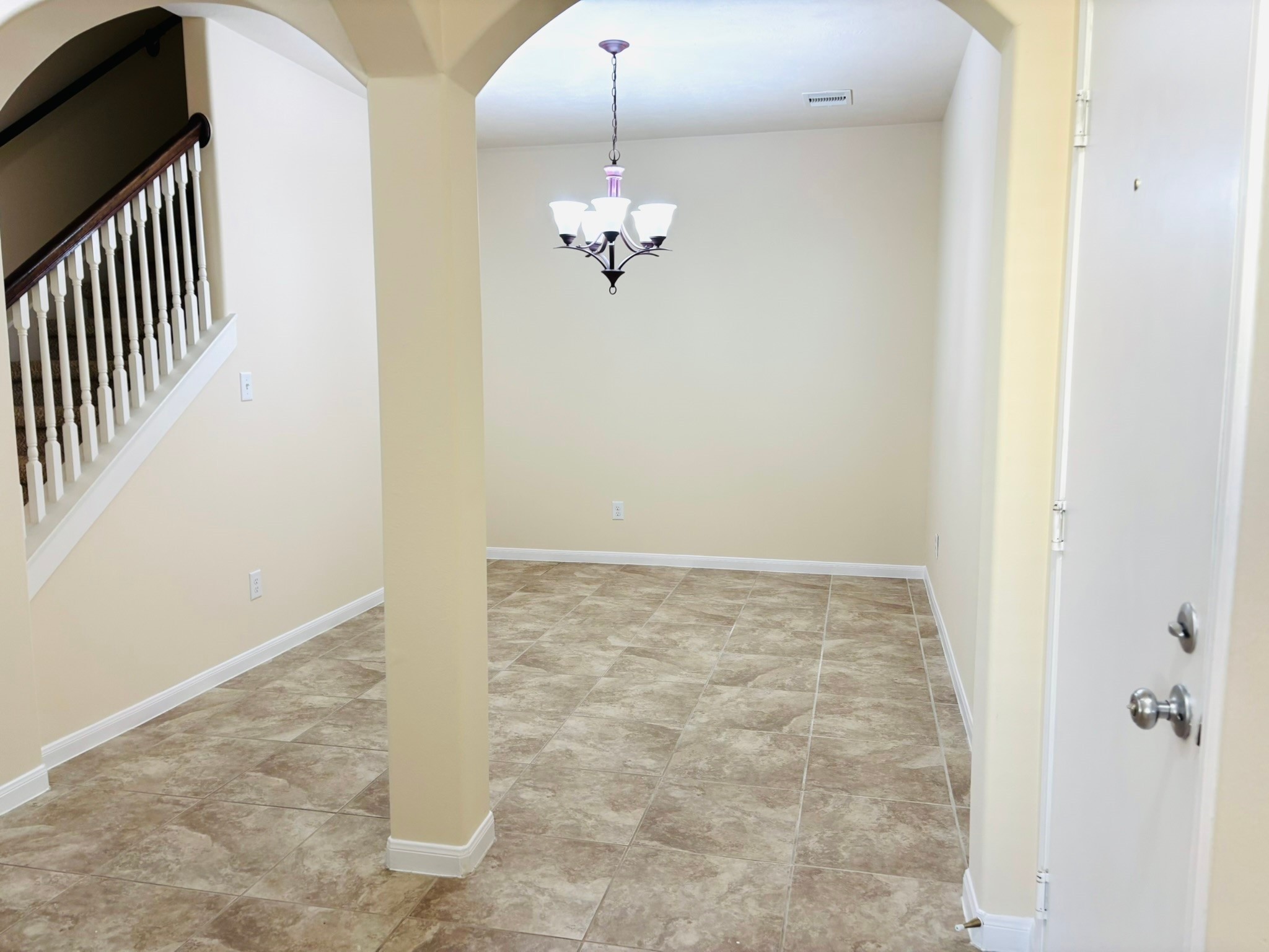 8525 Sunset Loch Drive Spring, TX 77379 - Photo 18 of 24 a view of a chandelier fan and wooden floor