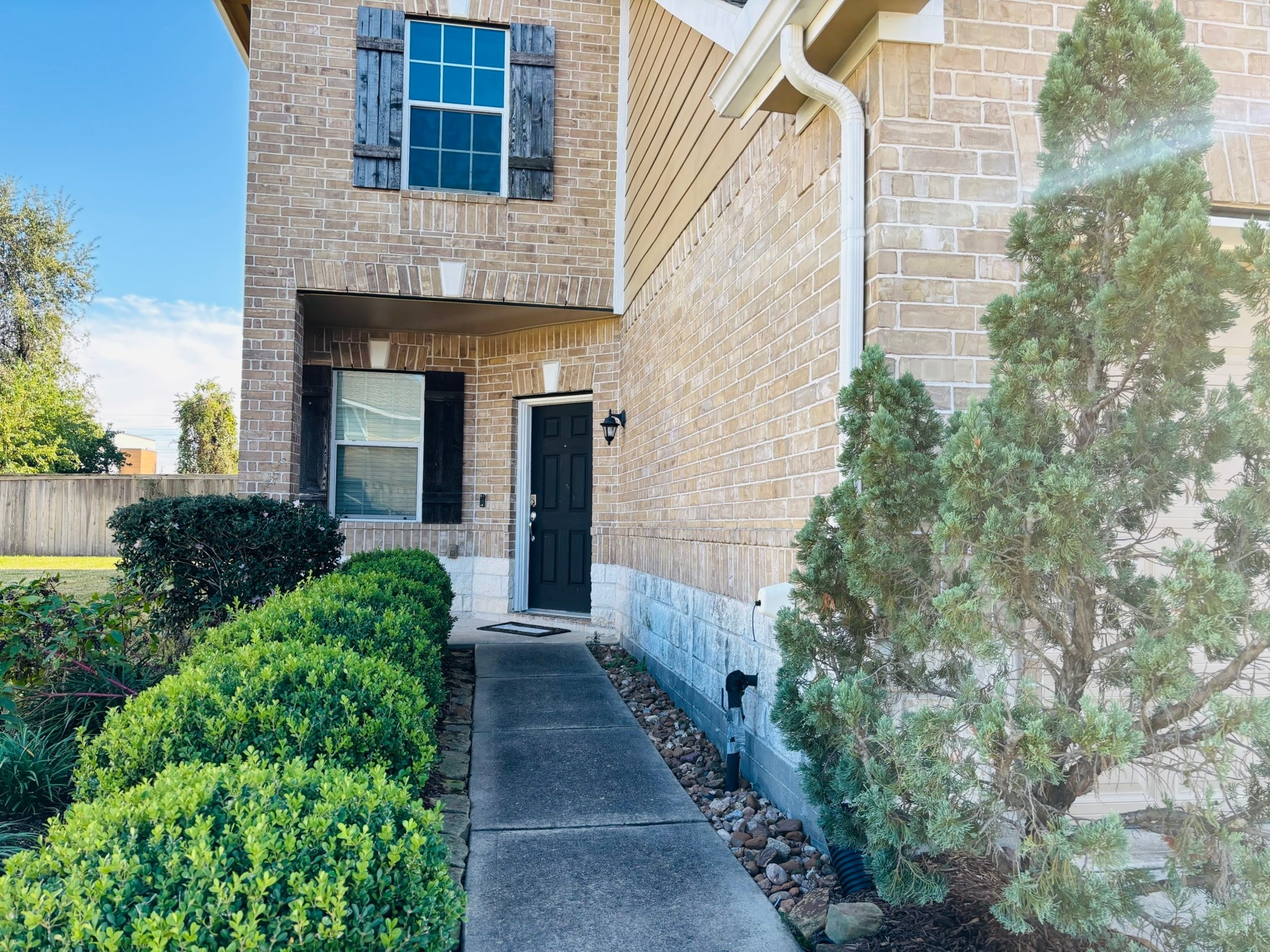 8525 Sunset Loch Drive Spring, TX 77379 - Photo 2 of 24 a view of a pathway with a house
