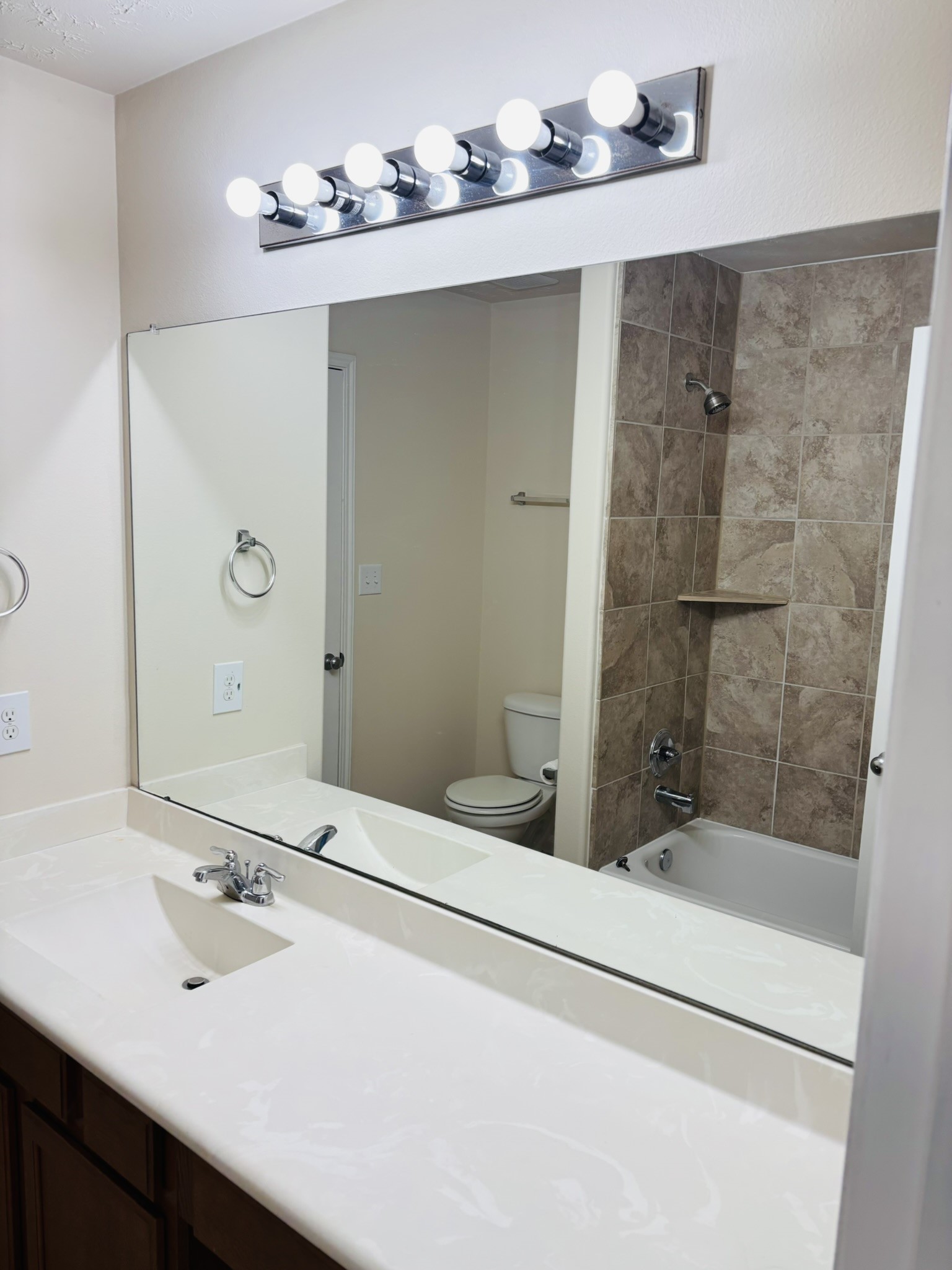 8525 Sunset Loch Drive Spring, TX 77379 - Photo 22 of 28 a bathroom with a sink and a mirror