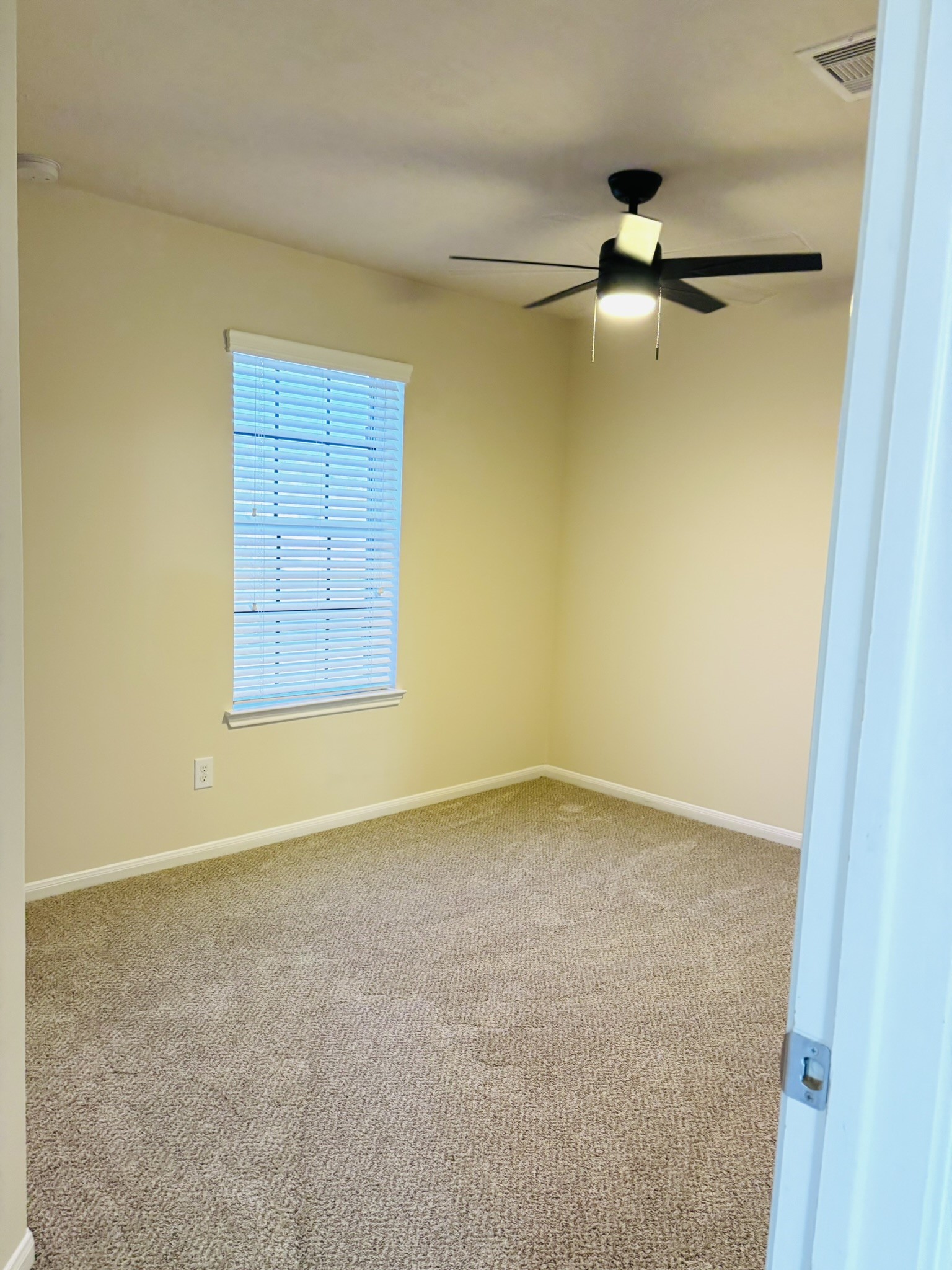 8525 Sunset Loch Drive Spring, TX 77379 - Photo 24 of 28 a view of an empty room with a window