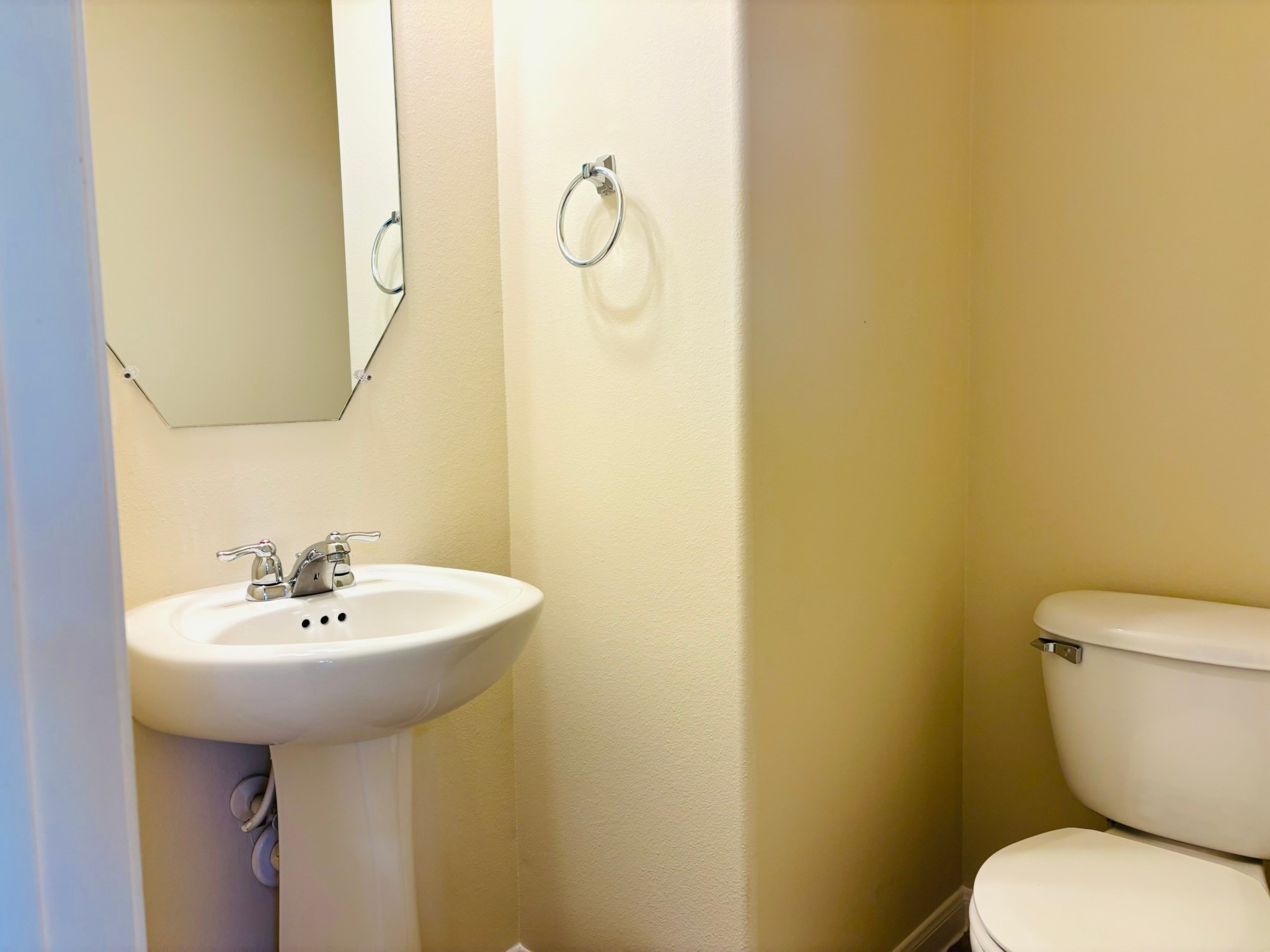 8525 Sunset Loch Drive Spring, TX 77379 - Photo 10 of 24 a bathroom with a sink and mirror