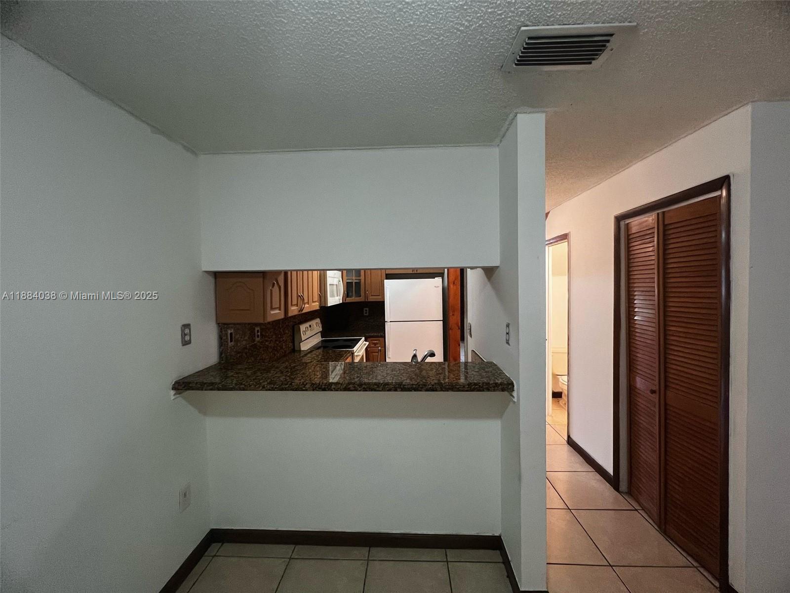13345 Southwest 59th Lane Miami, FL 33183 - Photo 11 of 29 a room with a sink