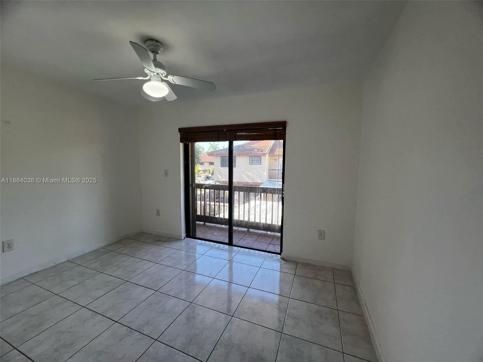 13345 Southwest 59th Lane Miami, FL 33183 - Photo 24 of 29 a view of an empty room with a window