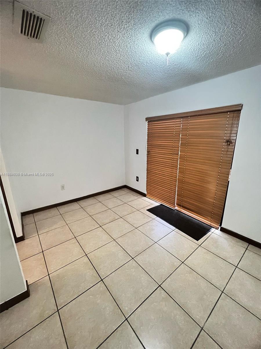13345 Southwest 59th Lane Miami, FL 33183 - Photo 9 of 29 a view of empty room
