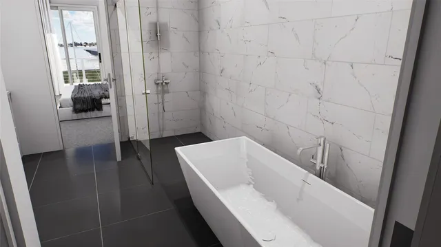 a bathroom with a bathtub and a shower