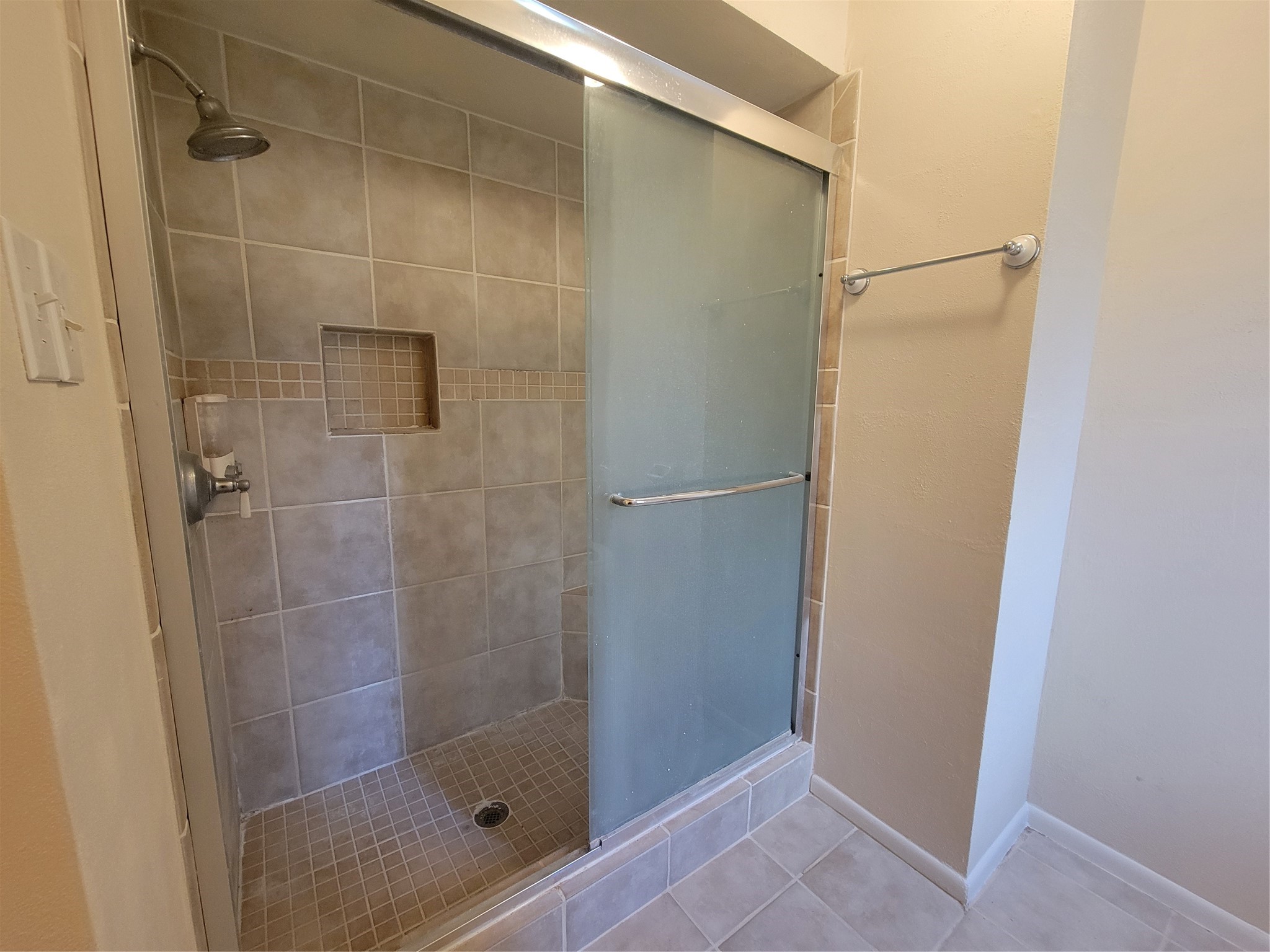 716 Player Court Conroe, TX 77302 - Photo 11 of 18 Large updated shower in en-suite bath.