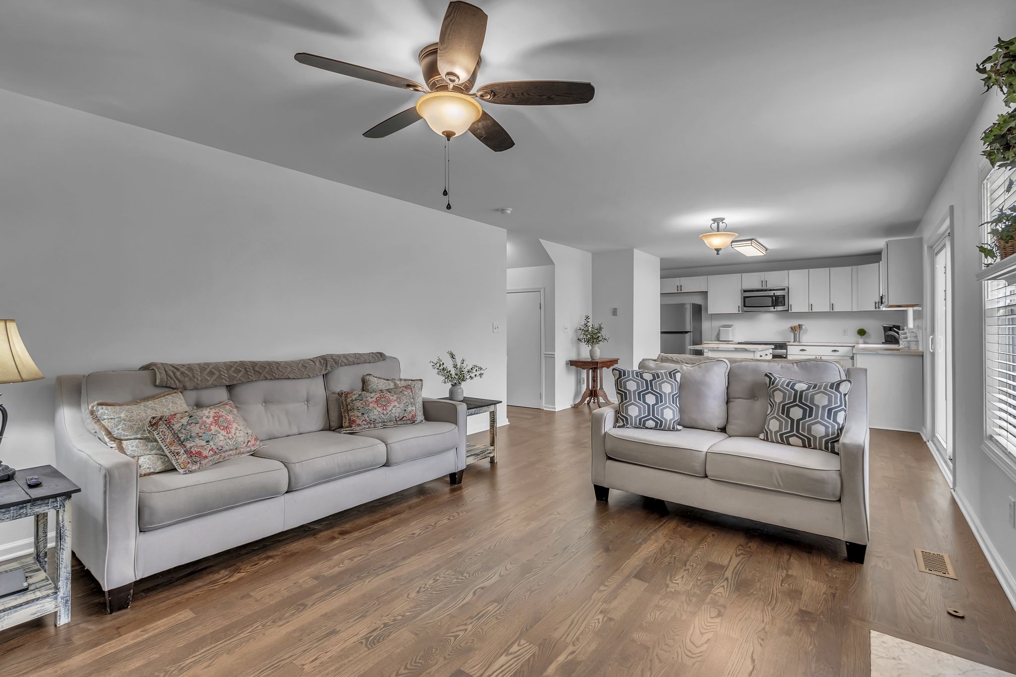 2006 Trenton Drive Spring Hill, TN 37174 - Photo 16 of 36 a living room with furniture kitchen view and a chandelier
