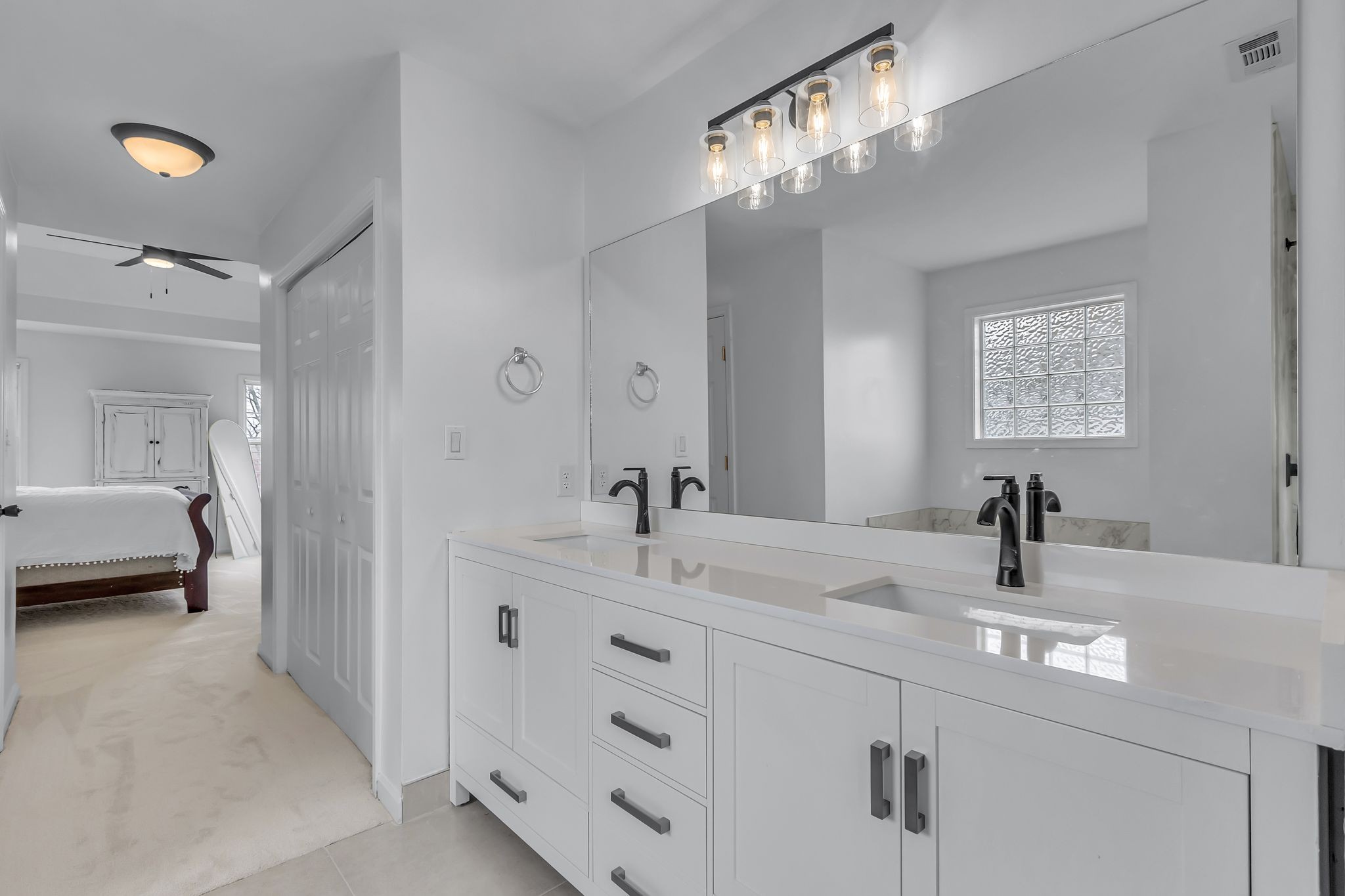 2006 Trenton Drive Spring Hill, TN 37174 - Photo 27 of 36 a en suite bathroom with a sink and a mirror