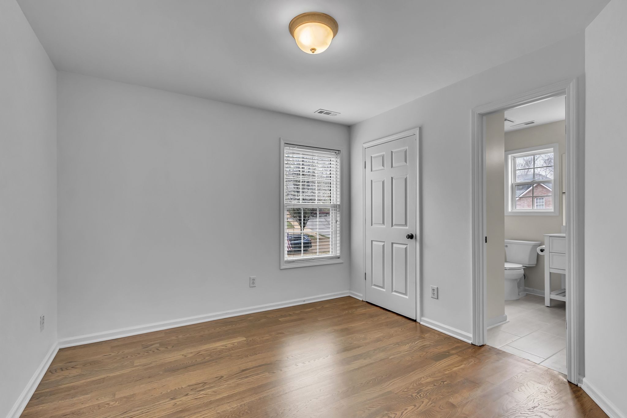 2006 Trenton Drive Spring Hill, TN 37174 - Photo 29 of 36 wooden floor in an empty room and a window