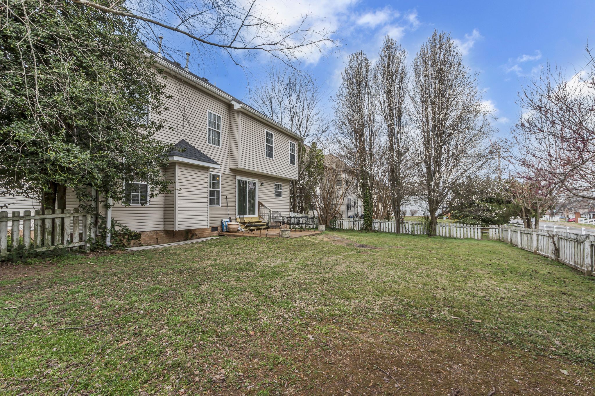2006 Trenton Drive Spring Hill, TN 37174 - Photo 35 of 36 a view of a house with a yard