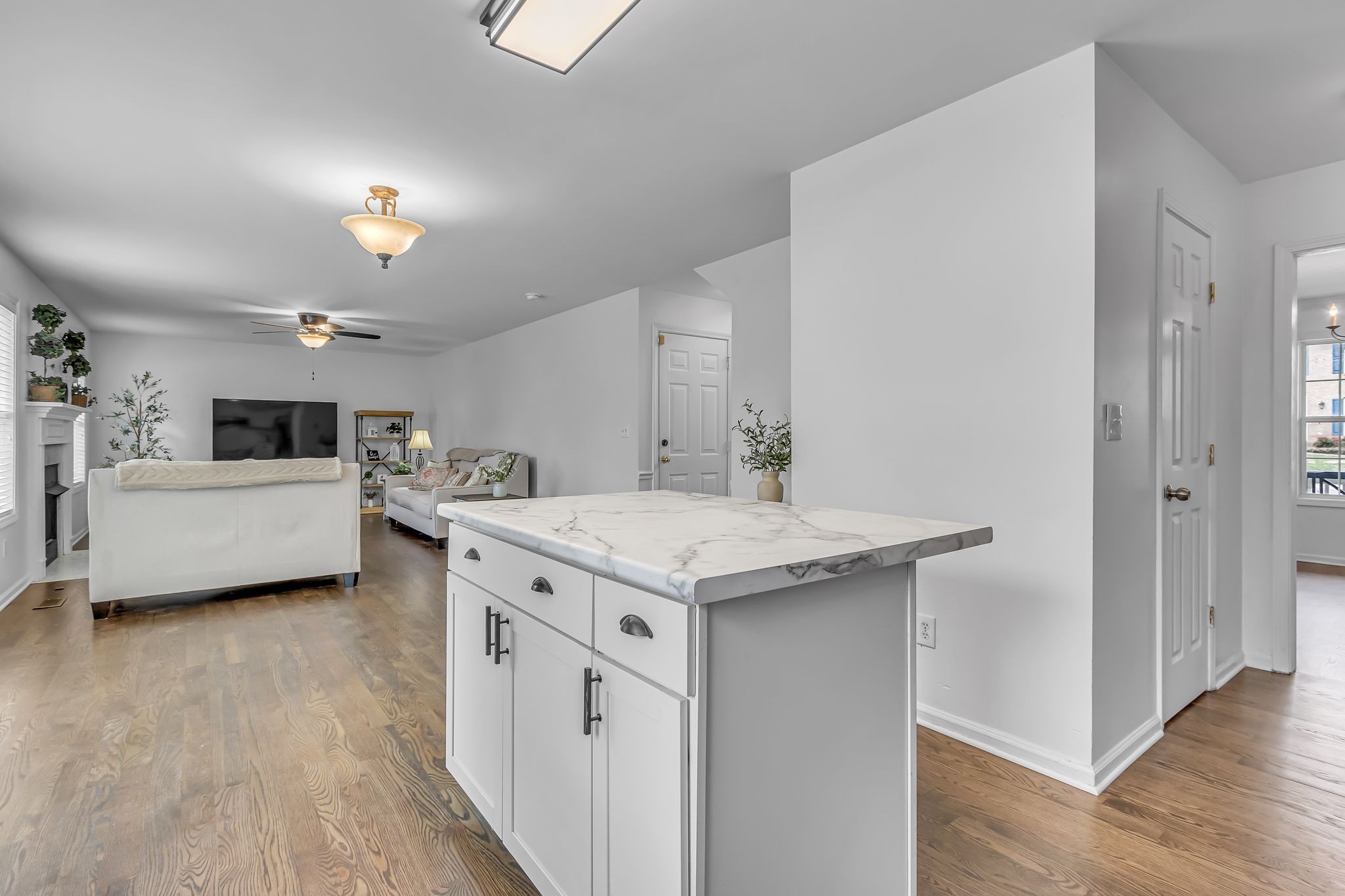 2006 Trenton Drive Spring Hill, TN 37174 - Photo 8 of 36 a view of living room with granite countertop furniture and fireplace