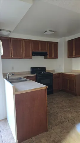 a view of a kitchen with cabinets