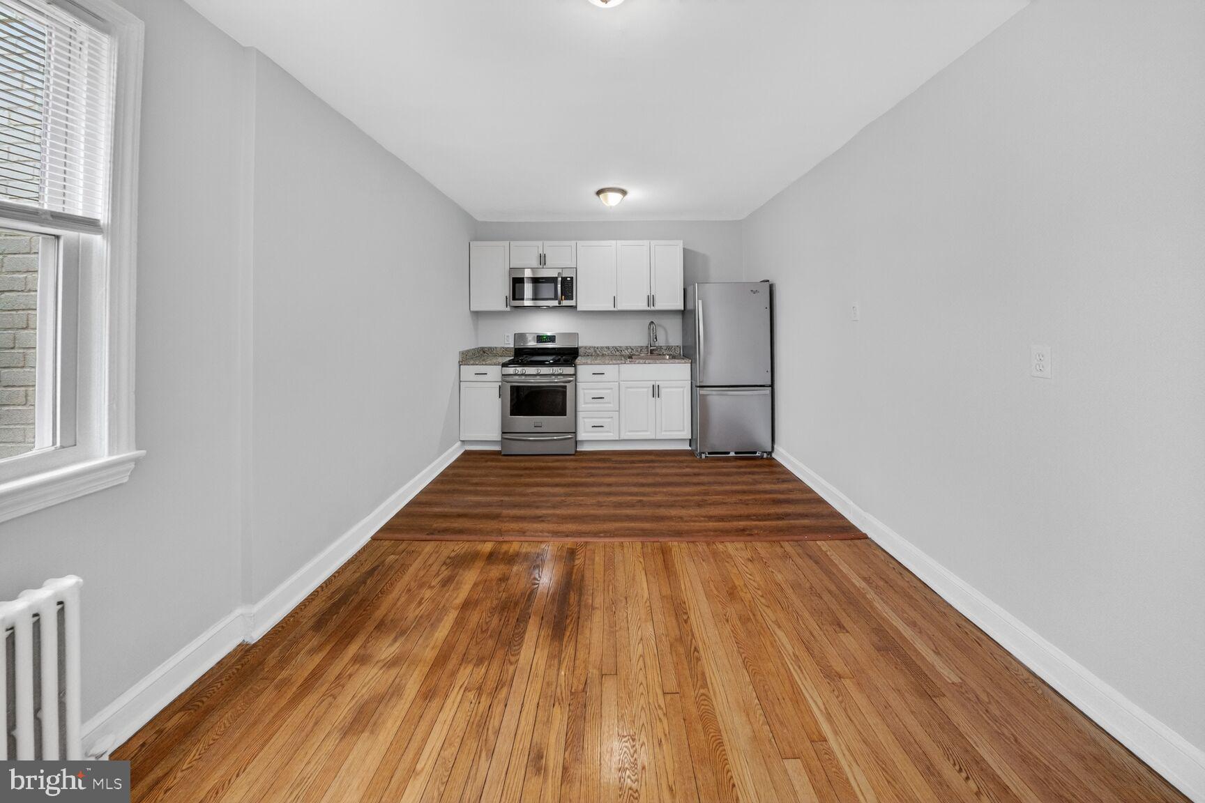 4701 Ravenswood Road, Unit 24 Riverdale, MD 20737 - Photo 6 of 14 Bright and airy kitchen space.