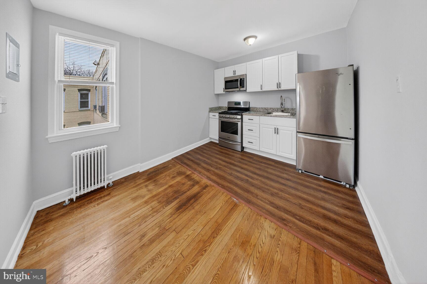 4701 Ravenswood Road, Unit 24 Riverdale, MD 20737 - Photo 7 of 14 Bright and inviting kitchen space.