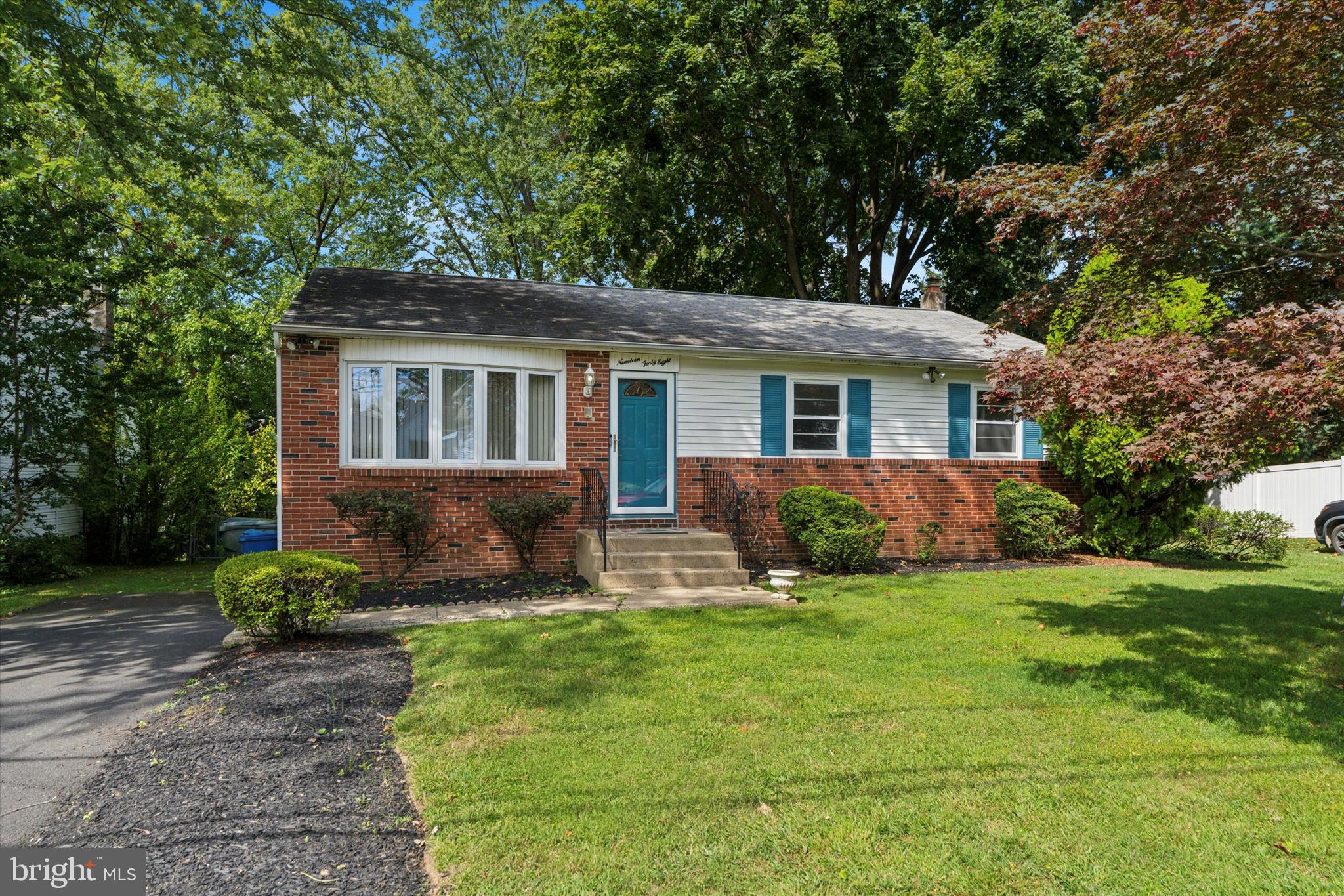 1948 Lukens Avenue Willow Grove, PA 19090 - Photo 2 of 23 a front view of a house with a yard and trees