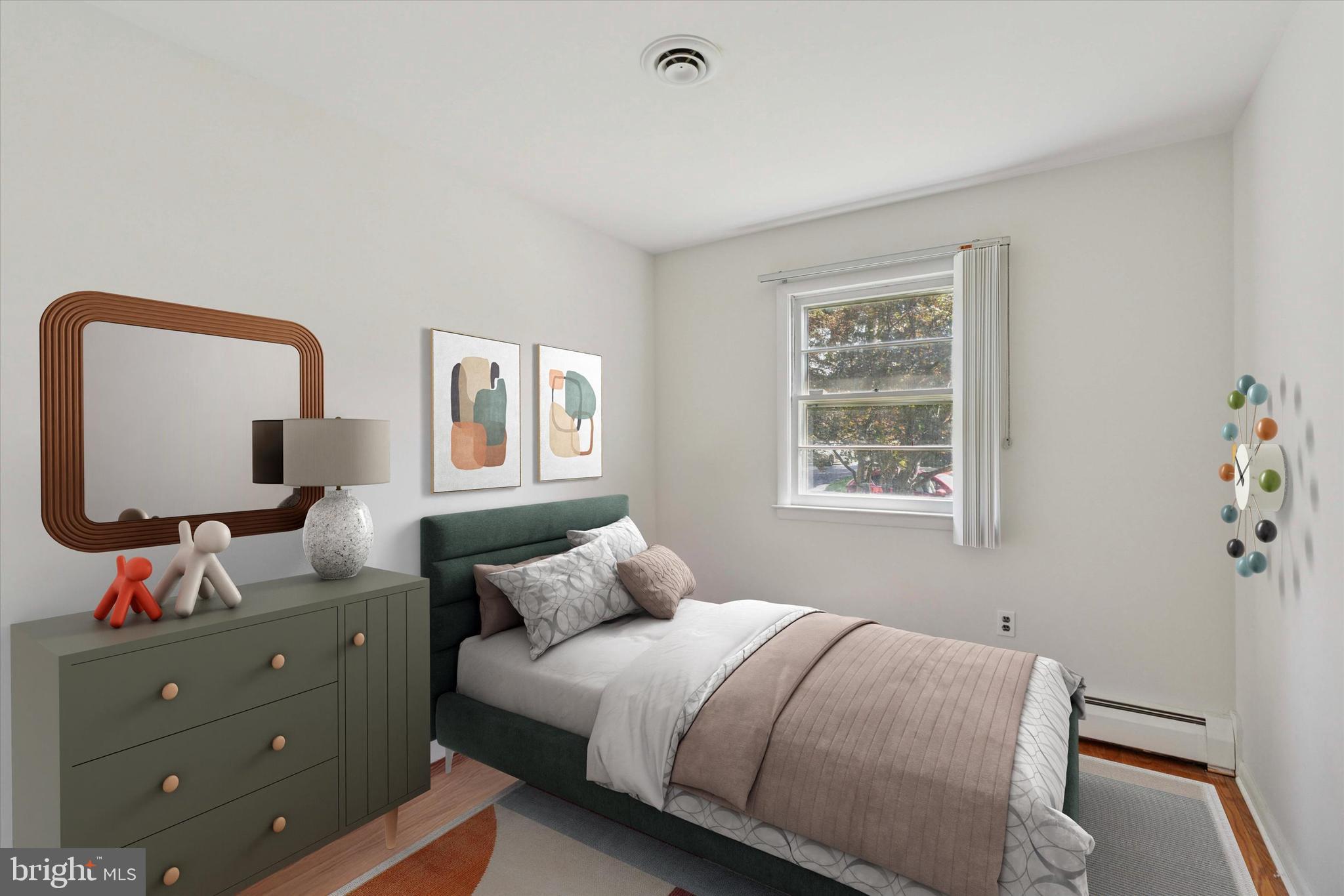 1948 Lukens Avenue Willow Grove, PA 19090 - Photo 7 of 23 a bedroom with a bed and a window