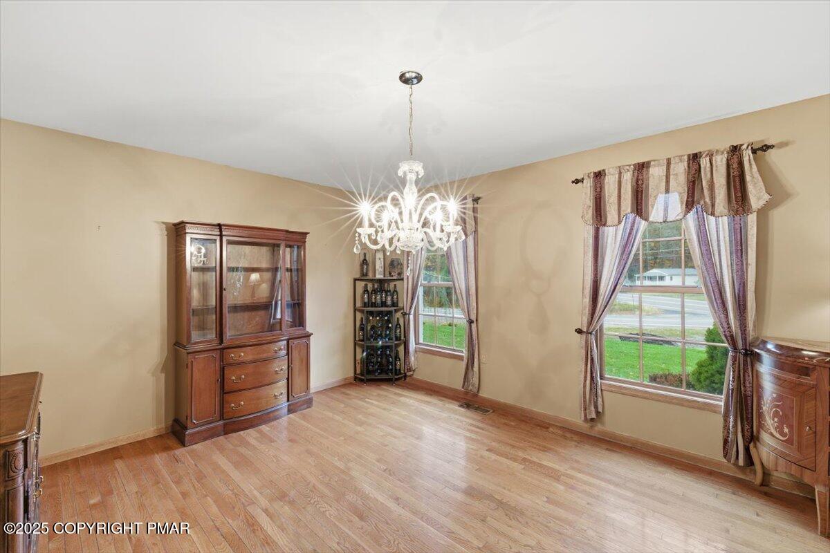 102 Arbor Way Stroudsburg, PA 18360 - Photo 17 of 51 a view of a room with window and wooden floor