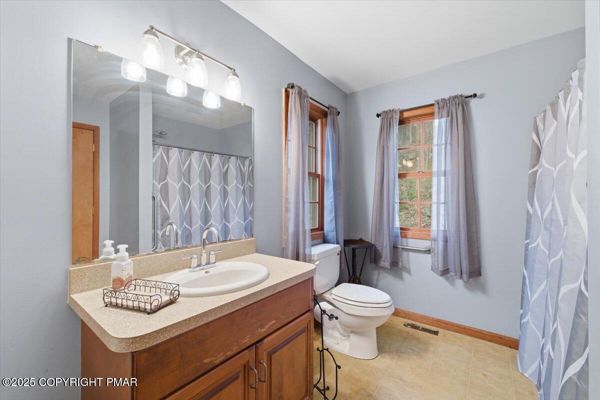 102 Arbor Way Stroudsburg, PA 18360 - Photo 30 of 51 a bathroom with a sink a toilet and shower