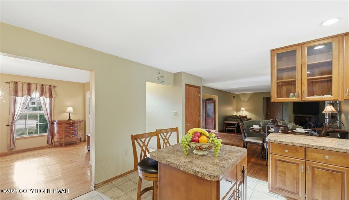 102 Arbor Way Stroudsburg, PA 18360 - Photo 10 of 51 a kitchen that has a table and chairs in it