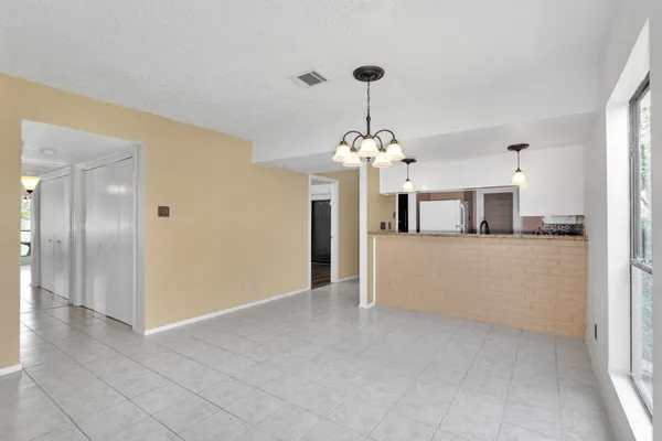 a view of livingroom with furniture and window