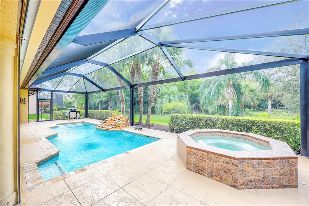 8862 Lely Island Circle Naples, FL 34113 - Photo 33 of 47 a view of swimming pool with seating space
