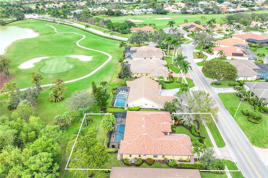 8862 Lely Island Circle Naples, FL 34113 - Photo 47 of 47 an aerial view of a house