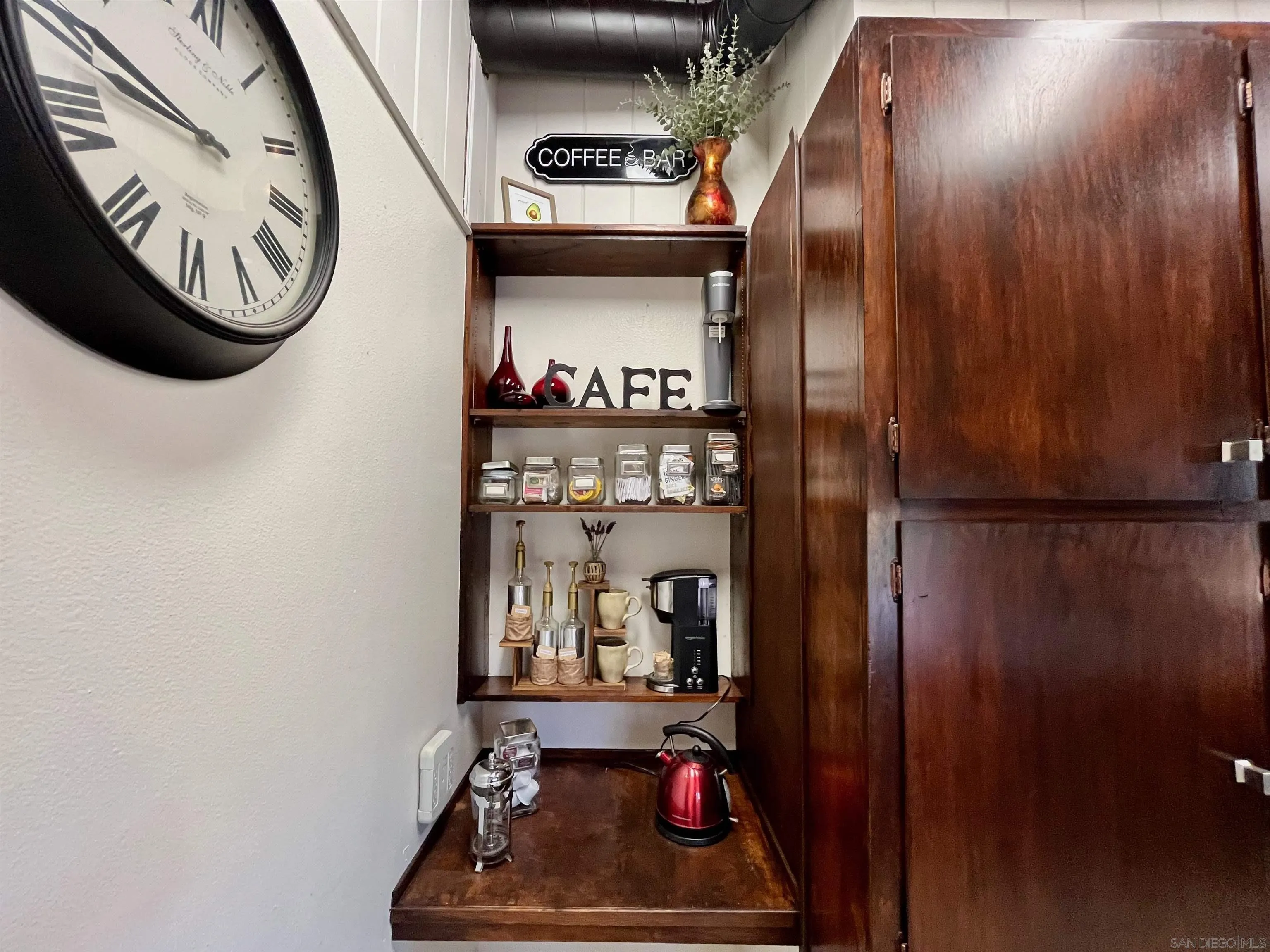 2824 Scenic View Road Alpine, CA 91901 - Photo 17 of 42 a room with lots of frames on wall and shower