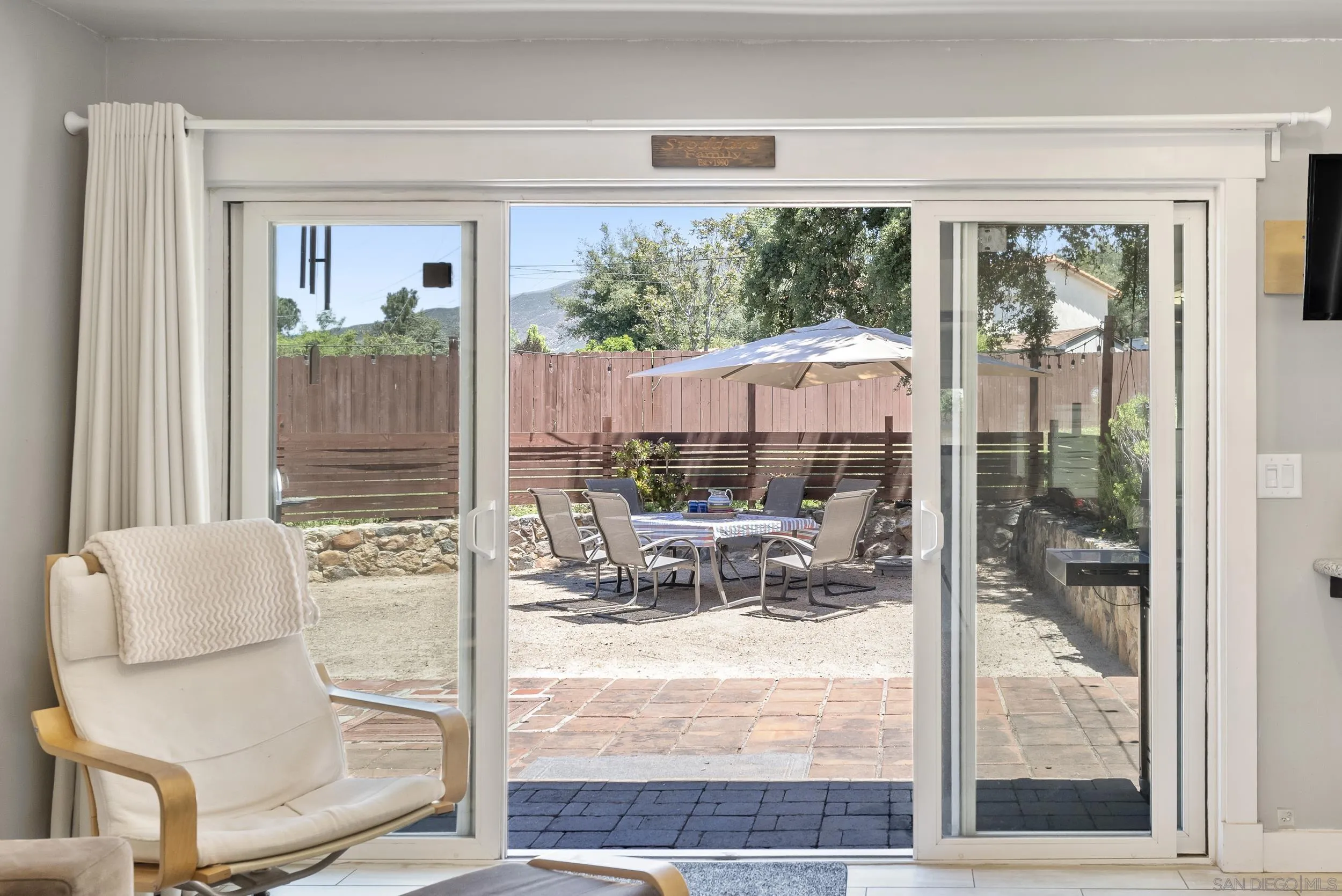 2824 Scenic View Road Alpine, CA 91901 - Photo 21 of 42 a living room filled with furniture and a table
