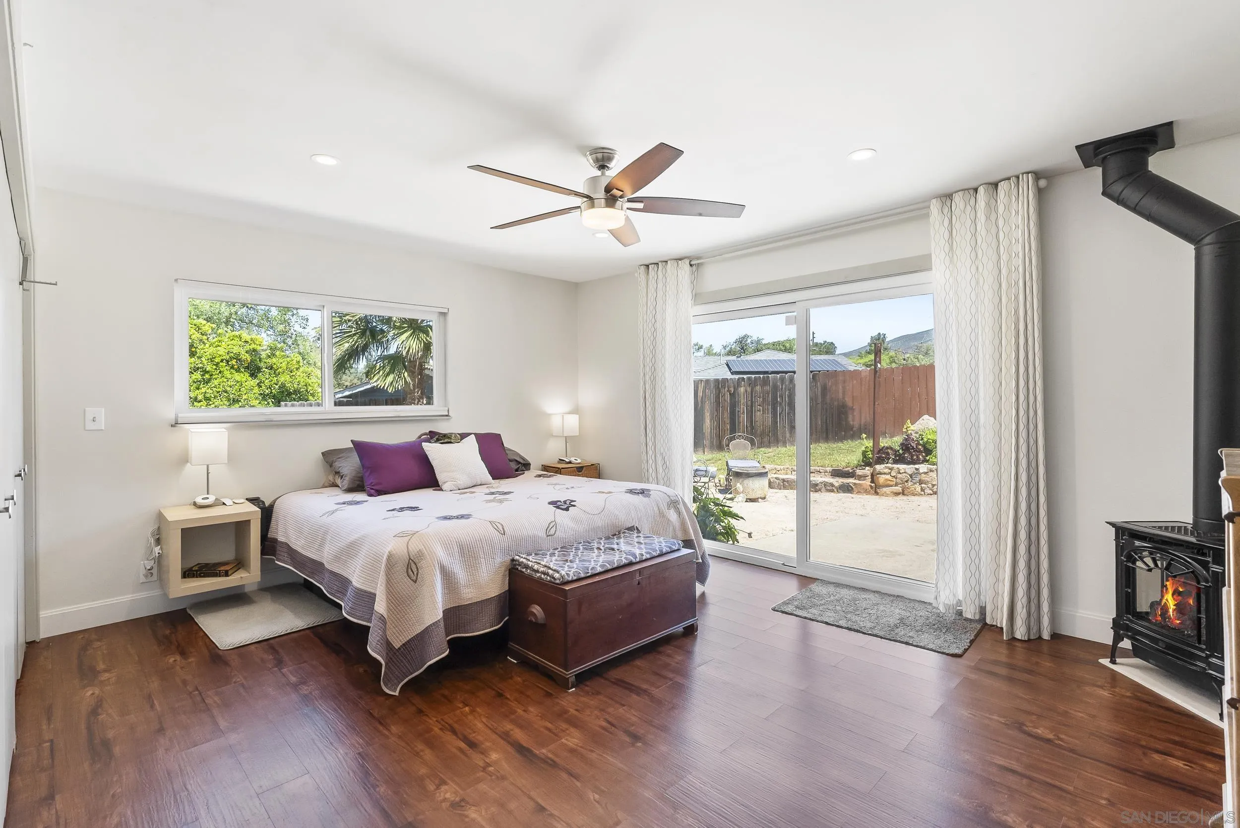 2824 Scenic View Road Alpine, CA 91901 - Photo 23 of 42 a bedroom with a large bed and a window