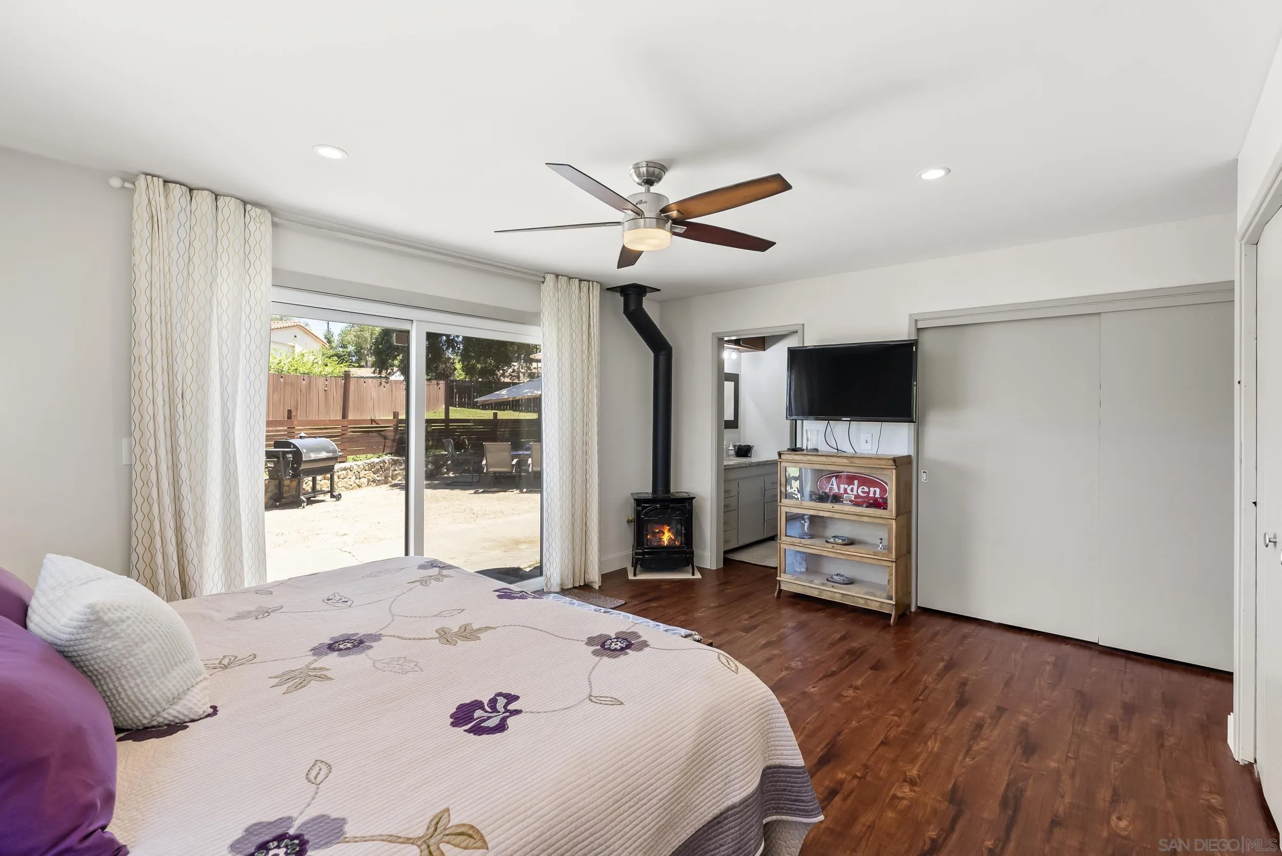 2824 Scenic View Road Alpine, CA 91901 - Photo 25 of 42 a bed room with furniture and a flat screen tv