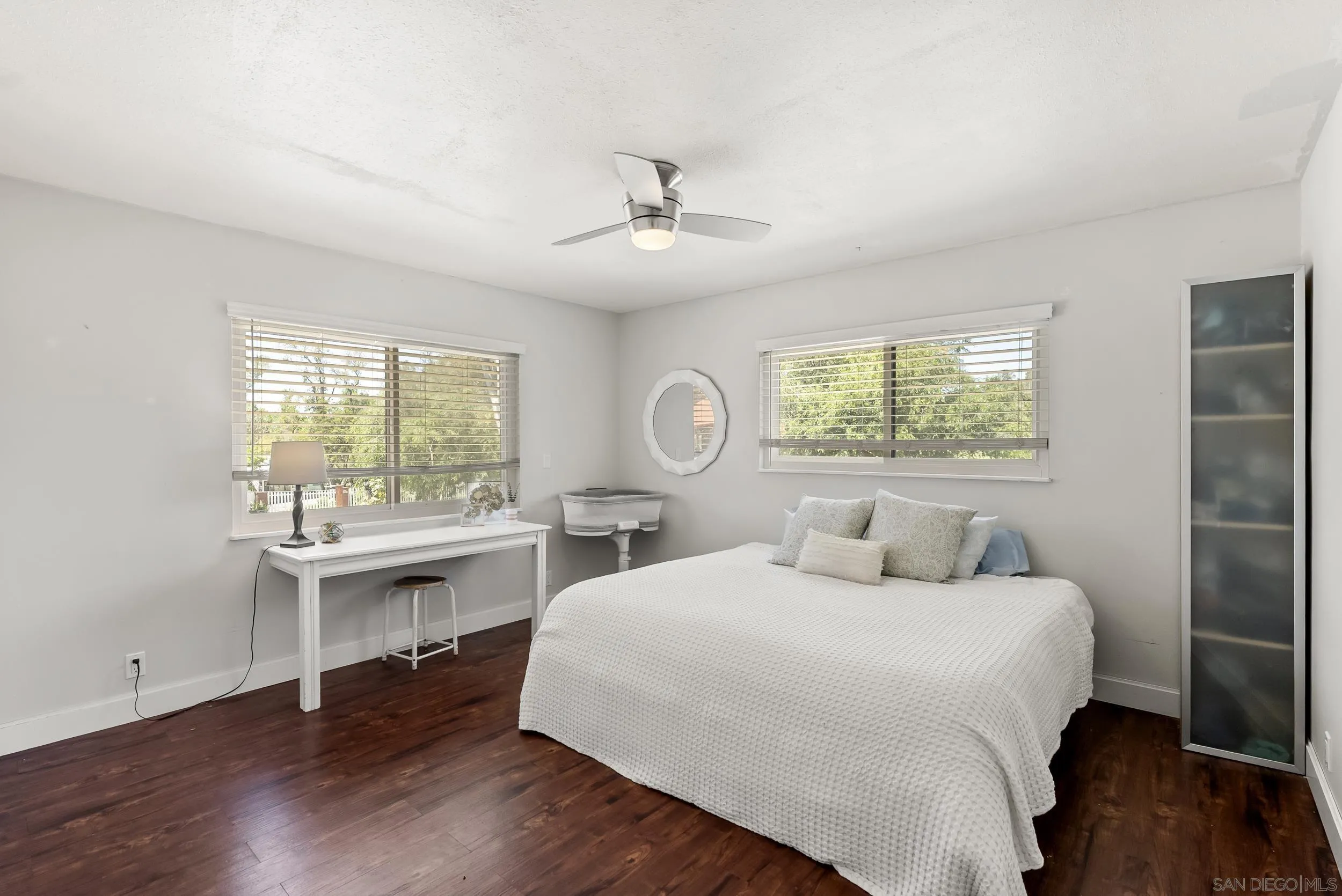2824 Scenic View Road Alpine, CA 91901 - Photo 27 of 42 a bedroom with a bed and a table with window