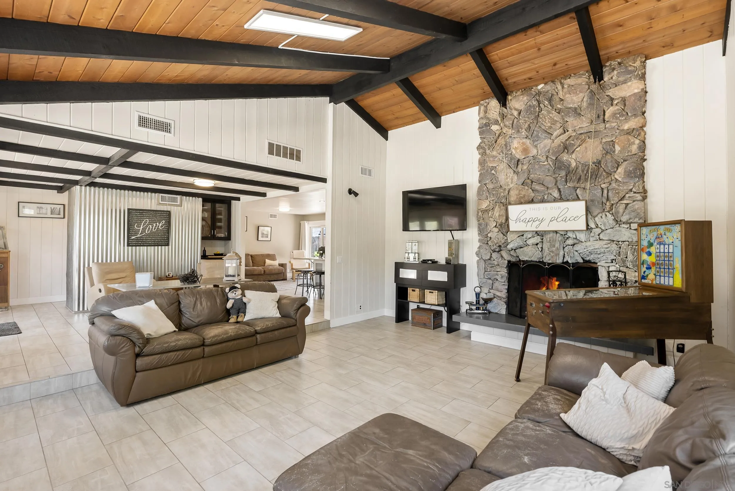 2824 Scenic View Road Alpine, CA 91901 - Photo 9 of 42 a living room with furniture and a fireplace