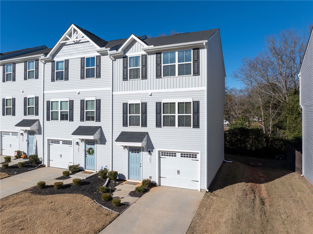 109 Brooklane Court Easley, SC 29642 - Photo 1 of 47 This charming townhome features inviting facades and convenient garages, nestled in a well-maintained setting.