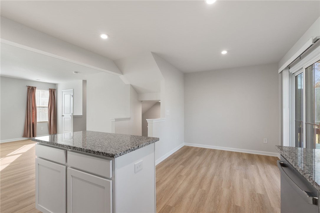 109 Brooklane Court Easley, SC 29642 - Photo 11 of 47 This bright, open space features a well-appointed kitchen with an island, perfect for gathering and entertaining.