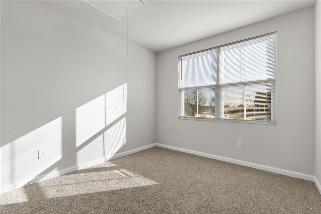 109 Brooklane Court Easley, SC 29642 - Photo 18 of 47 Bright, airy room with ample natural light, ideal for peaceful living.