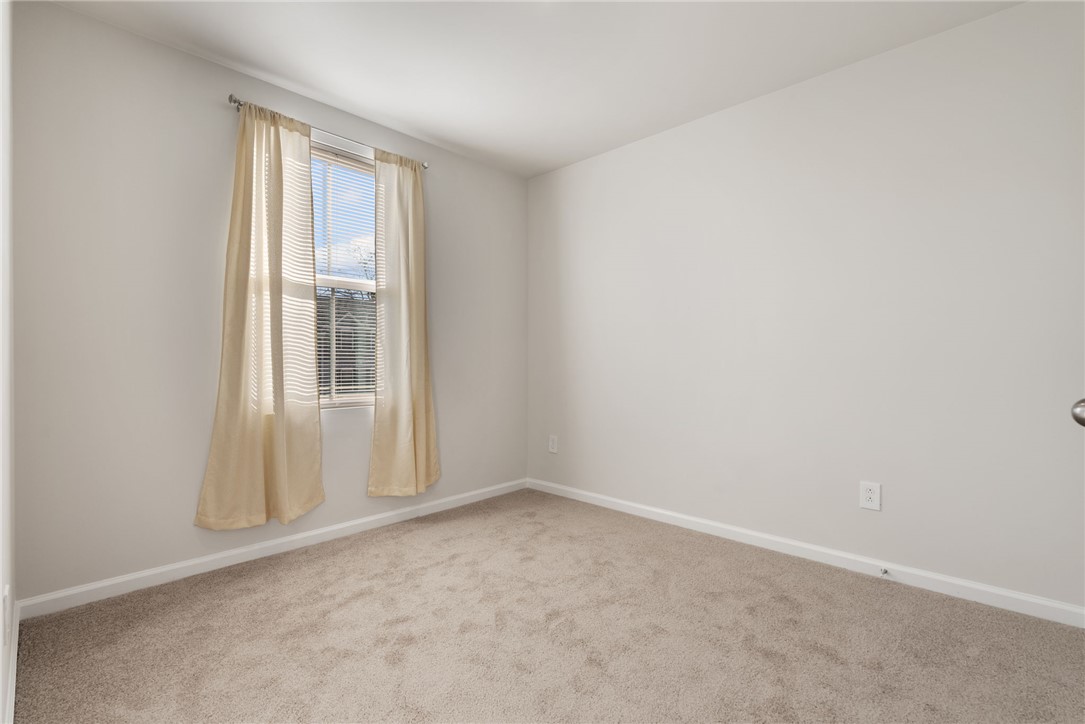 109 Brooklane Court Easley, SC 29642 - Photo 23 of 47 This cozy bedroom offers a serene retreat with soft carpeting and natural light.