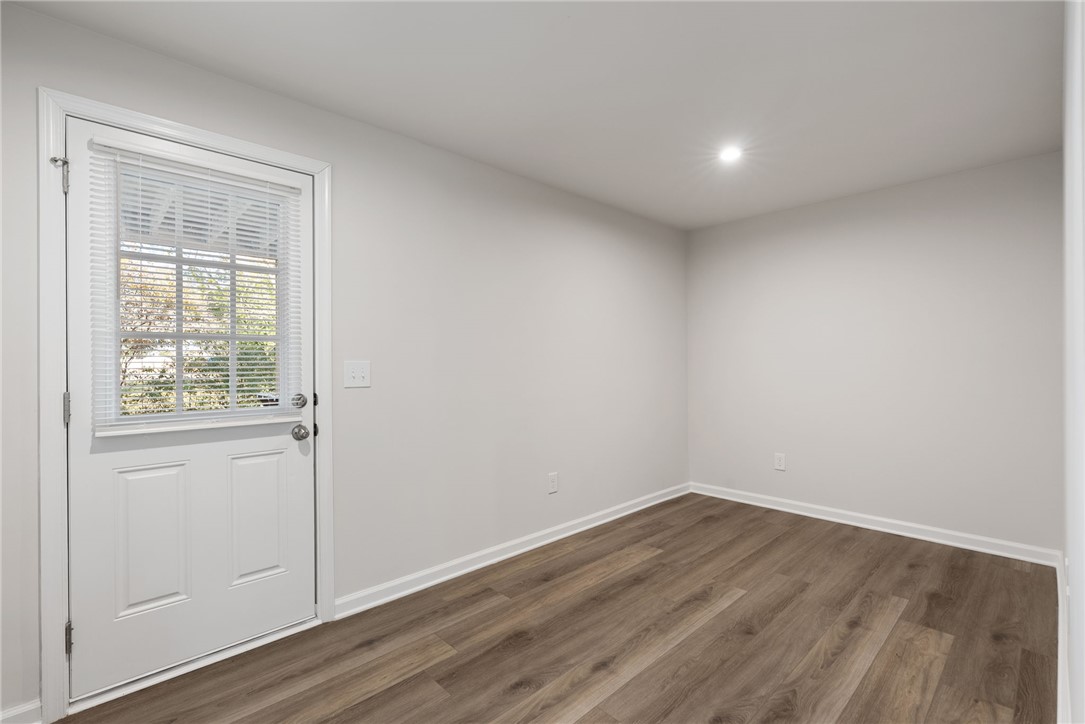 109 Brooklane Court Easley, SC 29642 - Photo 28 of 47 This versatile room features beautiful wood flooring and a bright door leading to the outdoors.