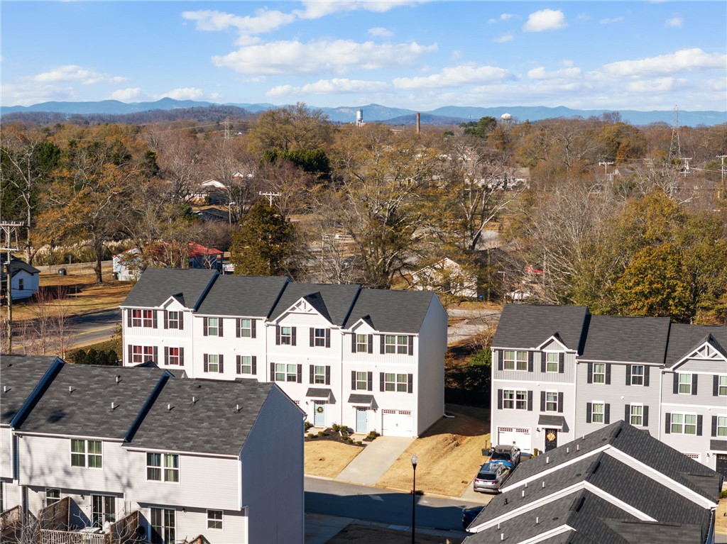 109 Brooklane Court Easley, SC 29642 - Photo 38 of 47 This elevated view captures townhomes nestled against a scenic mountainous backdrop.