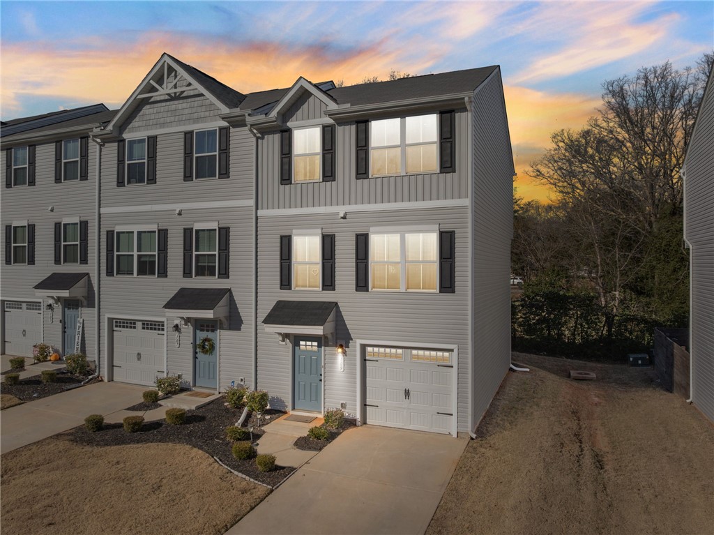 109 Brooklane Court Easley, SC 29642 - Photo 47 of 47 This townhome features a well-maintained exterior with classic siding and a welcoming entrance.