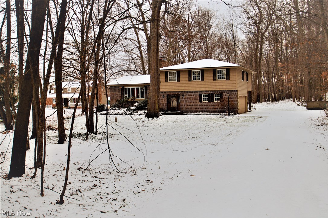 4202 Laubert Road Atwater, OH 44201 - Photo 1 of 31 Welcome to your home sweet home, nestled in the woods.