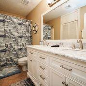 7998 East County Highway 30A, Unit 7 Inlet Beach, FL 32461 - Photo 13 of 16 a bathroom with a sink toilet and shower