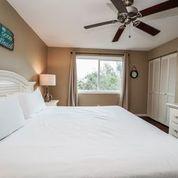 7998 East County Highway 30A, Unit 7 Inlet Beach, FL 32461 - Photo 16 of 16 a bedroom with a bed and a window