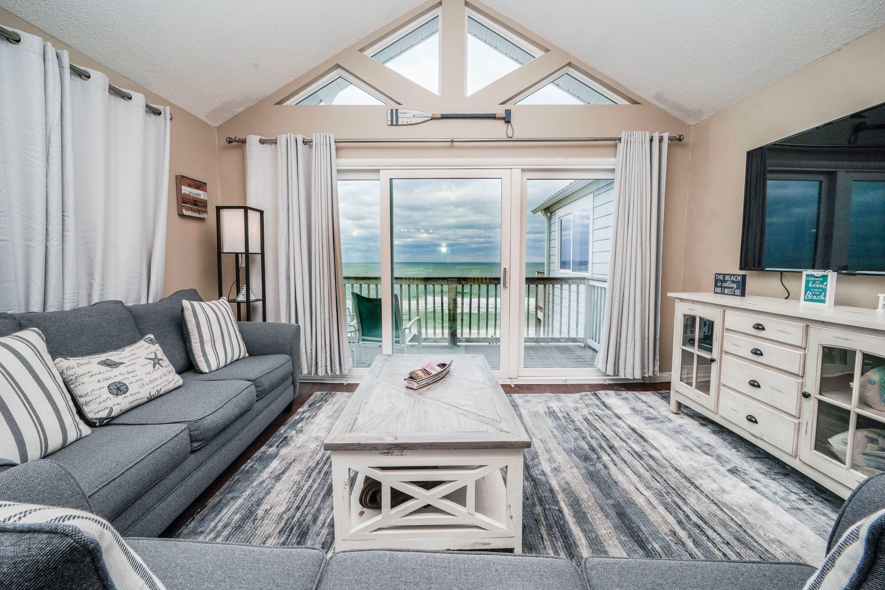 7998 East County Highway 30A, Unit 7 Inlet Beach, FL 32461 - Photo 7 of 16 a living room with furniture and a large window
