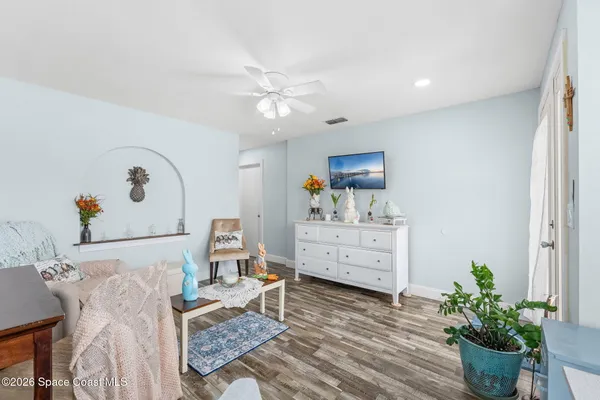 a bed room with furniture and decor