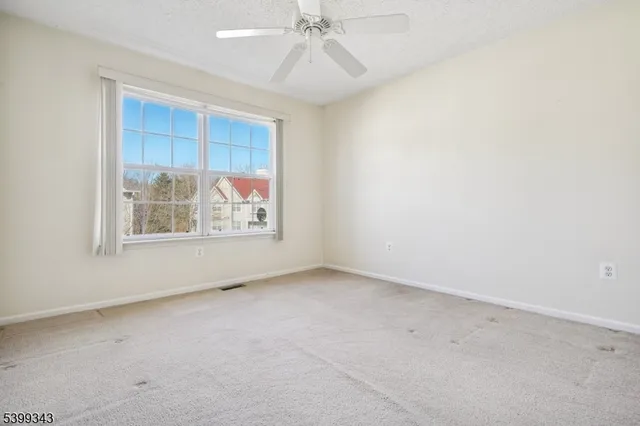 an empty room with window