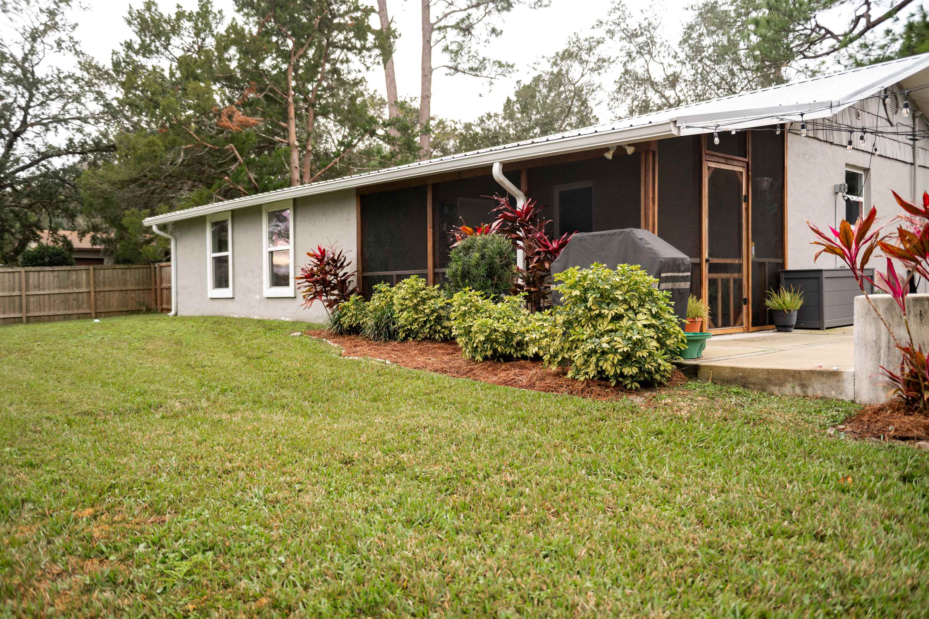321 Harvard Road St. Augustine, FL 32086 - Photo 35 of 35 a front view of house with yard and trees