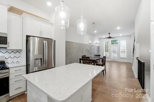a bathroom with a sink a mirror and a toilet