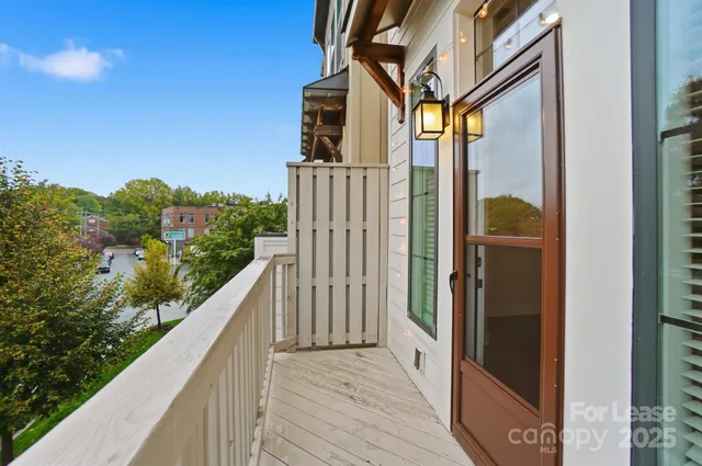 a view of a hallway with washer and dryer