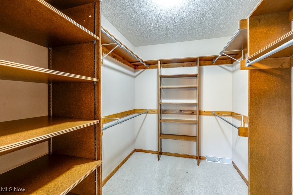 5613 Stoney Ridge Road Northwest Canton, OH 44718 - Photo 25 of 39 Primary Bedroom walk in closet