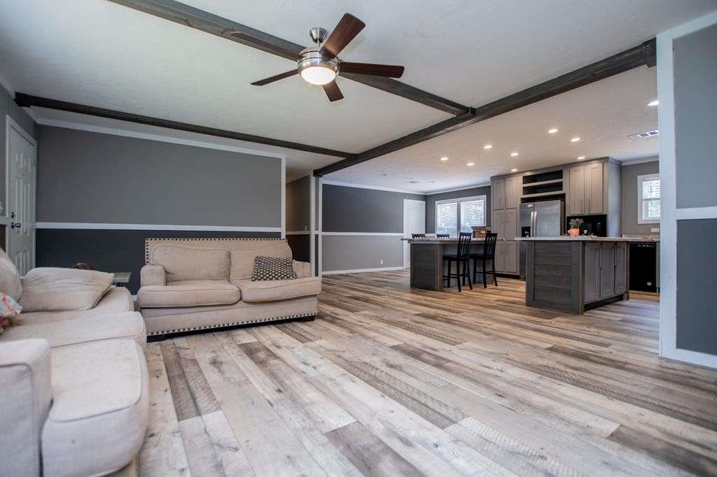 200 Duck Pond Road Roopville, GA 30170 - Photo 20 of 89 a living room with furniture and kitchen view
